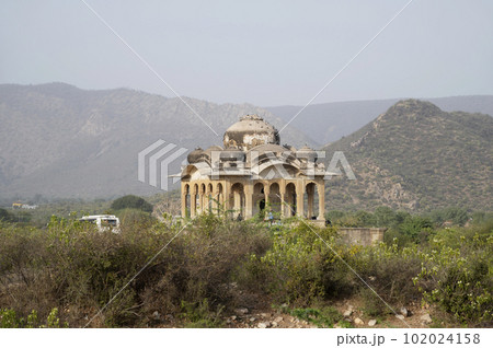 Ruins of an old tomb near the Bhangarh Fort, is a 16th-century fort built in 1573, Alwar district, Rajasthan, India 102024158