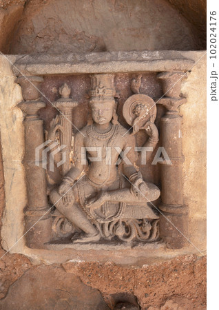 Carved idols on Harshnath Temple, an ancient Hindu temple dedicated to Lord Shiva, situated on the top of a hill at Harsh Ki Pahadi, dated 973 CE, Sikar, Rajasthan, India 102024176