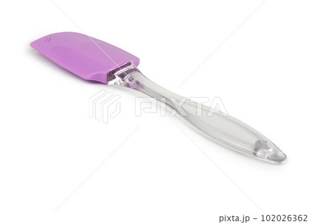 Pink rubber spatula, kitchen utensil. Isolated on white background. Side view. 102026362