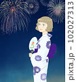 浴衣を着た女性と夜空に花火 102027313