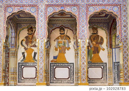 Colourful paintings on the inner wall of Dr. Ramnath Podar Haveli Museum, a cultural heritage museum which houses Rajasthani living style, miniature paintings, textiles, jewellery, and other items, 102028783