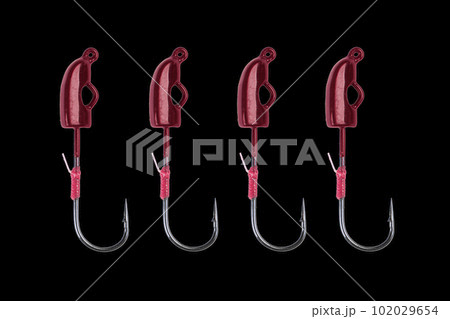 Fishing Hook Isolated on a Black Background. Jig Fishing Hook