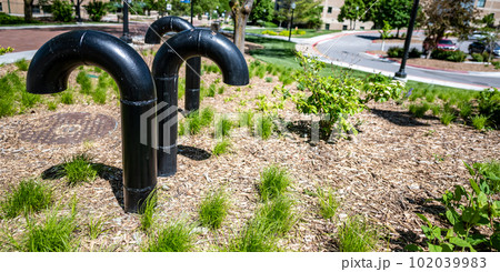 Underground structure manhole ventilation pipe in the shape of a candy cane. Underground structure manhole ventilation pipe in the shape of a candy cane. 102039983