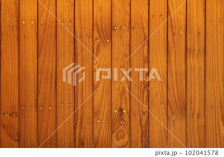 Natural wood slats wall or lath line arrange. Flooring pattern surface texture. Close-up of interior architecture material for design decoration background. Natural wood slats wall or lath line arrange. Flooring pattern surface texture. Close-up of interior architecture material for design decoration background. 102041578