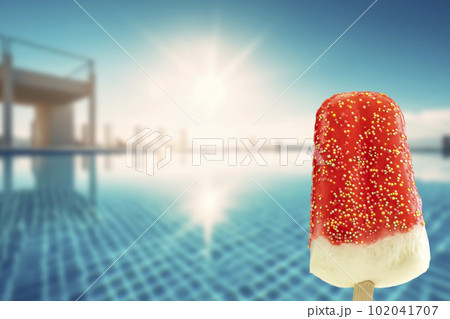 Bright fruit ice cream on a stick on a summer concept background. Frozen fruit ice. Summer mood. Cooling dessert in hot weather. Favorite delicacy for children. Homemade raspberry, strawberry 102041707