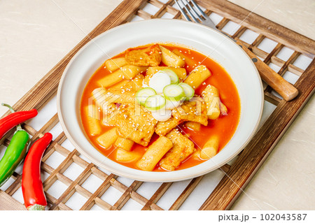 Tteokbokki, Stir-fried Rice Cake : Sliced rice cake bar (garaetteok) or thin rice cake sticks (Tteokbokkitteok) stir-fried in a spicy gochujang sauce with vegetables and fish cakes. Tteokbokki, Stir-fried Rice Cake : Sliced rice cake bar (garaetteok) or thin rice cake sticks (Tteokbokkitteok) stir-fried in a spicy gochujang sauce with vegetables and fish cakes. 102043587