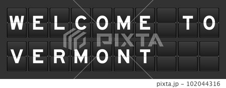 Black color analog flip board with word welcome to vermont on gray background Black color analog flip board with word welcome to vermont on gray background 102044316