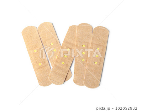 Medical sticking plasters isolated on white. First aid item 102052932