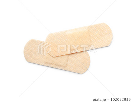 Medical sticking plasters isolated on white. First aid item 102052939