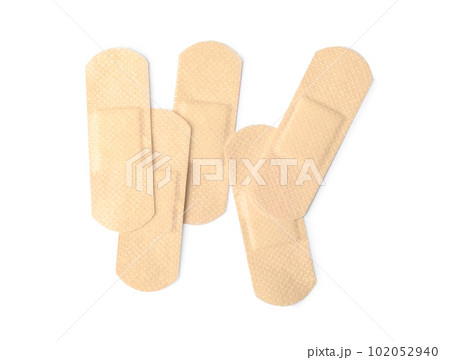 Medical sticking plasters isolated on white. First aid item 102052940