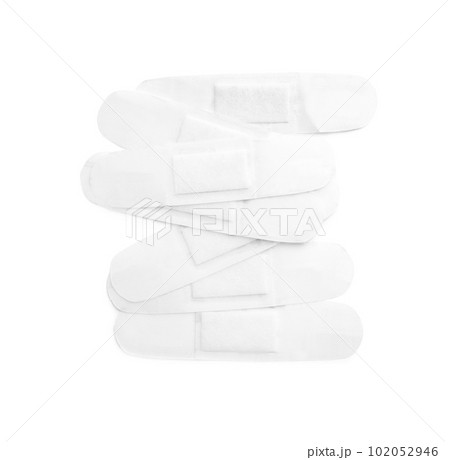 Medical sticking plasters isolated on white. First aid item Medical sticking plasters isolated on white. First aid item 102052946