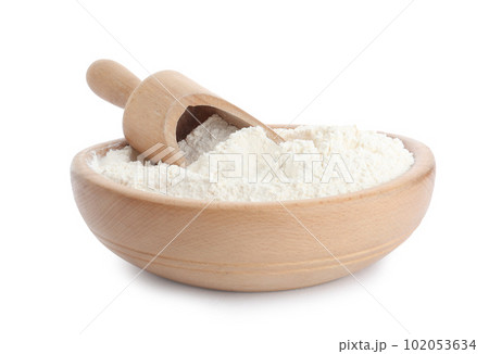 Organic flour and scoop in wooden bowl isolated on white 102053634