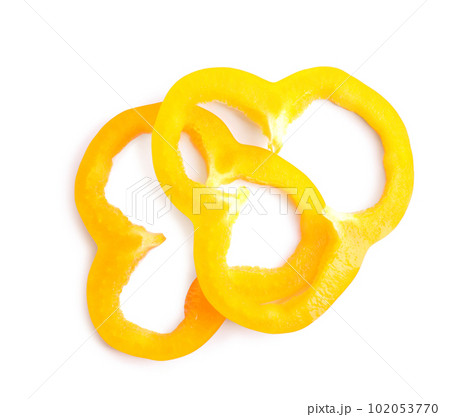 Slices of orange bell pepper isolated on white Slices of orange bell pepper isolated on white 102053770