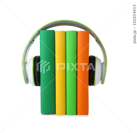Books with modern headphones isolated on white Books with modern headphones isolated on white 102054013