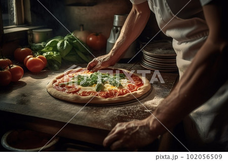 Pizza maker prepares a pizza in a typical pizzeria, Pizza margherita is ready for cooking, behind him there is the oven on, on the pizza there is basil, mozzarella and tomato. Generative AI. 102056509
