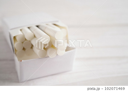 Cigarette in pack, roll tobacco in paper with filter tube, No smoking concept. 102071469