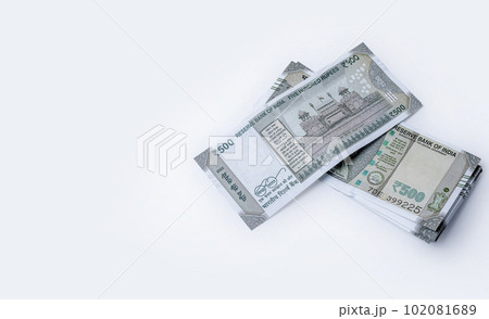 Indian currency, Stack of money isolated on white background with copy space for text. 500 hundred rupee notes 102081689