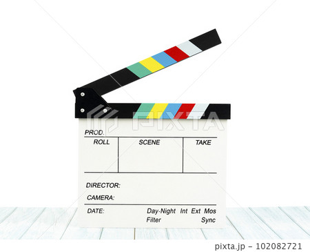 The Film slate or Flying clapperboard on wooden table isolated on white background, Save clipping path. 102082721