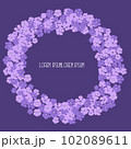 Circular frame with pink floral pattern with space for text and purple background, vector 102089611