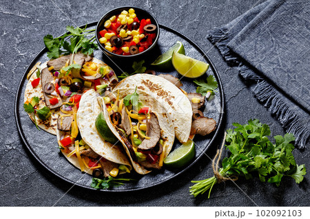Beef Steak Tacos with veggies, avocado, corn 102092103