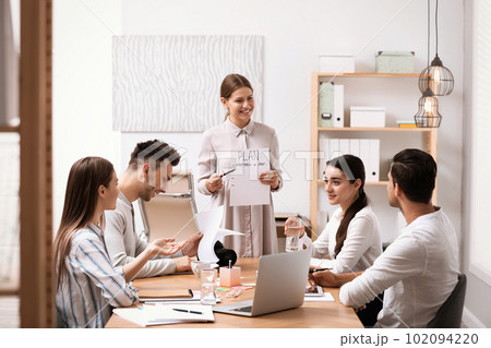 Team of professional journalists working in office 102094220