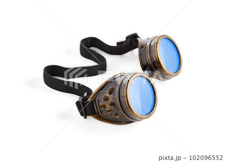 Vintage brass or copper welder's goggles with blue glasses isolated on white background 102096552