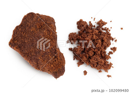 Dark muscovado sugar or Barbados sugar isolated on white background. Top view. Flat lay 102099480