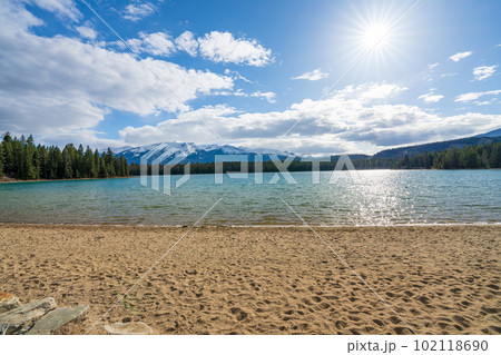 Lake Annette lake shore beach, Jasper National Park stunning nature scenery in summer time. Landscape of Canadian Rockies, Alberta, Canada. 102118690