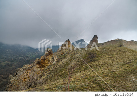 Landscape of Karadag Reserve in spring. View of rocks of ridge Karagach. Crimea 102119514