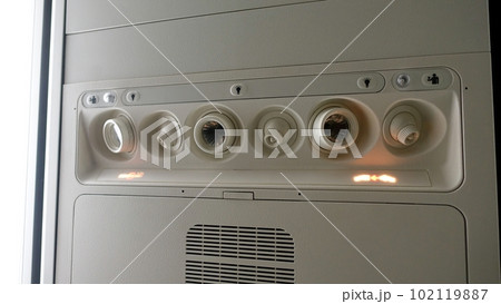 Detail of the ceiling of the interior of an airplane. 102119887
