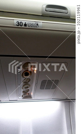 Detail of the ceiling of the interior of an airplane. Detail of the ceiling of the interior of an airplane. 102119961