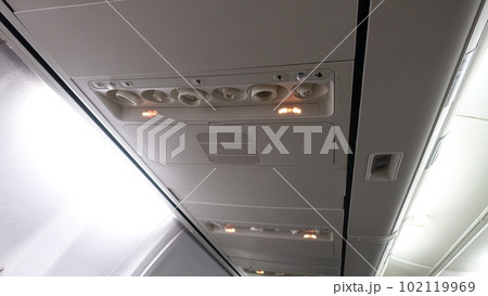 Detail of the ceiling of the interior of an airplane. 102119969