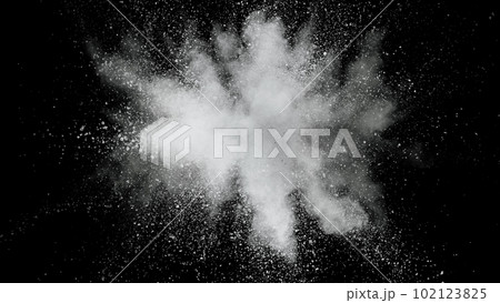Freeze motion of white color powder exploding on black background. Freeze motion of white color powder exploding on black background. 102123825