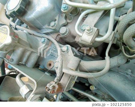 Diesel truck engine or truck engine with copy space for text. Metallic background of the internal diesel truck engine or car engine. 102125850