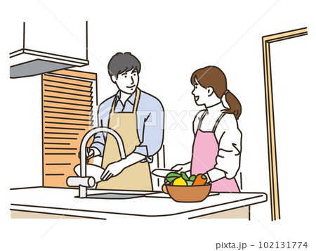キッチンで料理をする若い男女 102131774