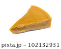 A piece of natural beeswax on a white background. 102132931