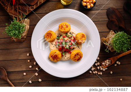 Portion of vegetarian falafels with hummus Portion of vegetarian falafels with hummus 102134887