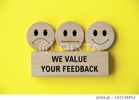 We value your feedback text on wooden block with happy, sad and neutral emoticon faces on wooden circle. Customer feedback, satisfaction and evaluation and concept We value your feedback text on wooden block with happy, sad and neutral emoticon faces on wooden circle. Customer feedback, satisfaction and evaluation and concept 102136952