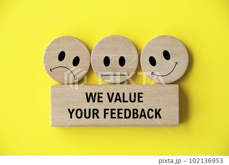 We value your feedback text on wooden block with happy, sad and neutral emoticon faces on wooden circle. Customer feedback, satisfaction and evaluation and concept We value your feedback text on wooden block with happy, sad and neutral emoticon faces on wooden circle. Customer feedback, satisfaction and evaluation and concept 102136953