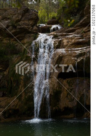 Pure mountain creek with green water Pure mountain creek with green water 102137068