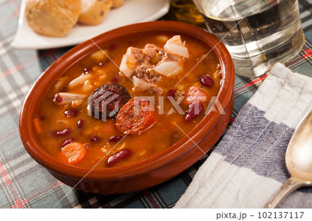 Beans stewed with chorizo and sausages Beans stewed with chorizo and sausages 102137117