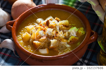Cream soup with croutons and cheese Cream soup with croutons and cheese 102137606