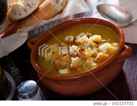Cream soup with croutons and cheese Cream soup with croutons and cheese 102137721