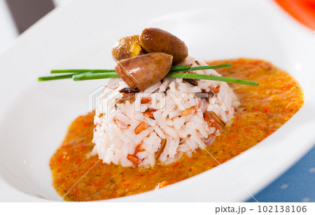Delicious chicken heart with rice in a sea of hot tomato-cream sauce Delicious chicken heart with rice in a sea of hot tomato-cream sauce 102138106