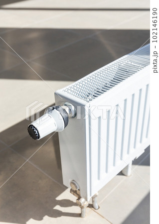 Close-up of white central heating floor radiator Close-up of white central heating floor radiator 102146190