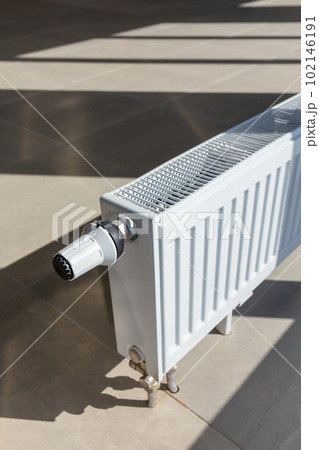 Close-up of white central heating floor radiator Close-up of white central heating floor radiator 102146191