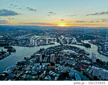 GOLD COAST, AUSTRALIA - APRIL 25, 2021 Bird eye view of mountain and river and high rise buildings GOLD COAST, AUSTRALIA - APRIL 25, 2021 Bird eye view of mountain and river and high rise buildings 102155650