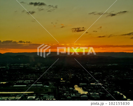 Panorama aerial view of Sunset scene to the far mountain with city center skyline landscape Panorama aerial view of Sunset scene to the far mountain with city center skyline landscape 102155830