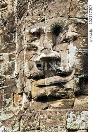 Face carved in stone in Angkor Wat Face carved in stone in Angkor Wat 102157307
