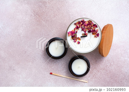 Candles and matches on a napkin. Cozy warm composition. View from above Candles and matches on a napkin. Cozy warm composition. View from above 102160993